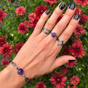 4 Directions Ring worn with Amethyst Amulet Ring, Amethyst Amulet Bracelet + Star Child Ring.  Part of the Season of the Witch Collection by Alex Lozier Jewelry.