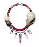 One of a kind necklace with skull, crystals + beads of sapphire, ruby + spinel. Set in oxidized sterling silver.