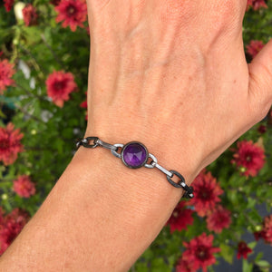 Amethyst Amulet Bracelet with Handmade Chain on wrist.  Part of the Season of the Witch Collection by Alex Lozier Jewelry.