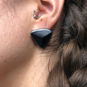 Black Tourmaline Shield earrings on ear.  Part of the Season of the Witch collection by Alex Lozier Jewelry.
