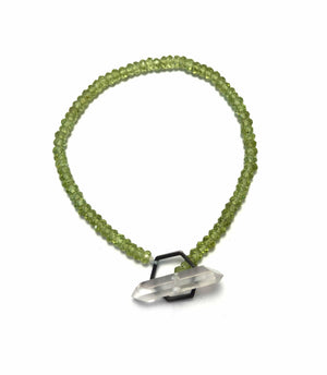 Crystal clasp bracelet on peridot beads