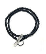 Crystal clasp bracelet on black spinel beads