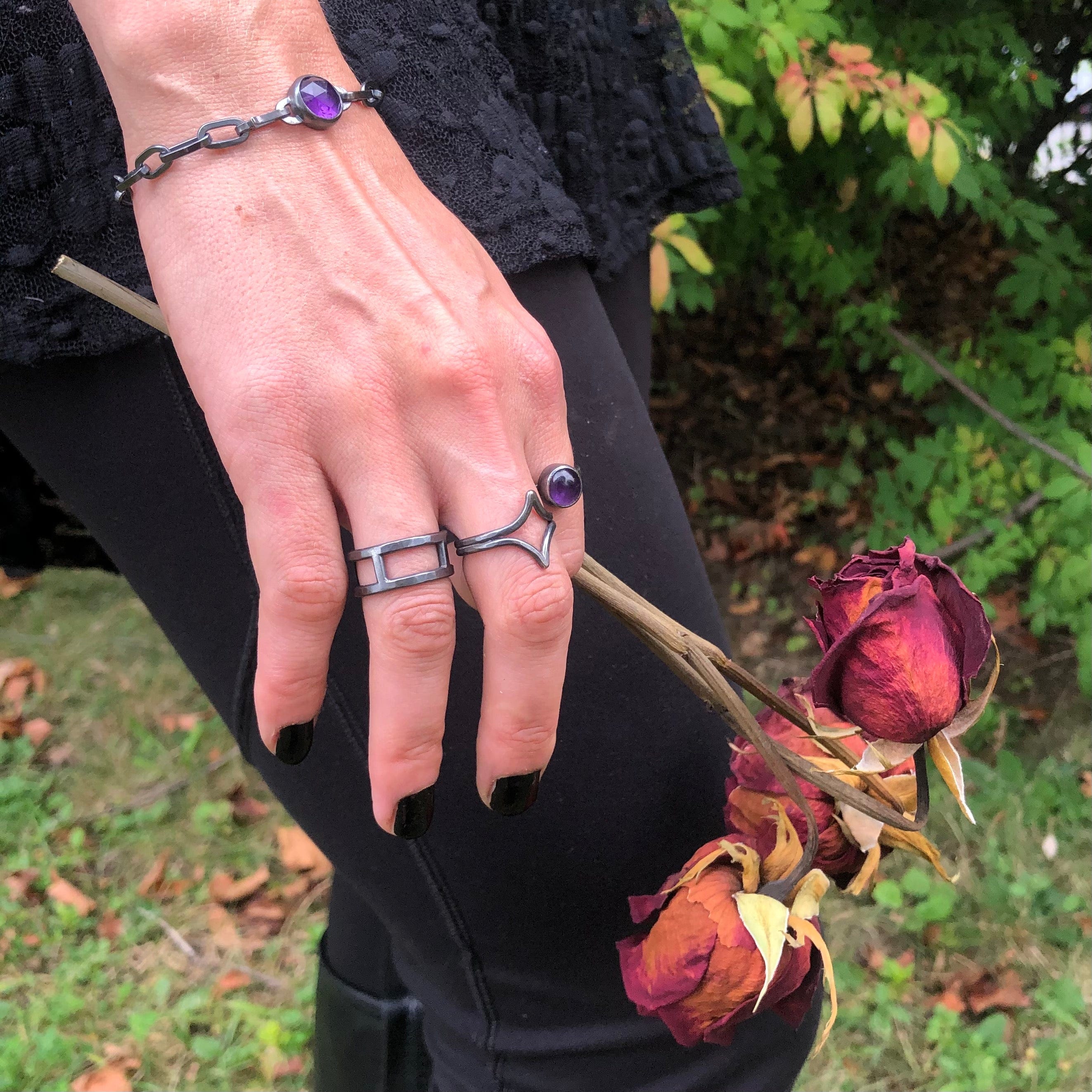 Star Child Ring worn with Amethyst Amulet Ring, Amethyst Amulet Bracelet + 4 Directions Ring.  Part of the Season of the Witch Collection by Alex Lozier Jewelry.