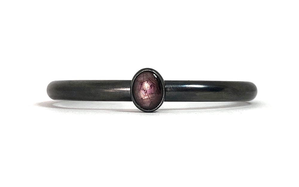 Star Ruby Bangle bracelet set in oxidized sterling silver.  Handmade by Alex Lozier Jewelry.  Season of the Witch collection.