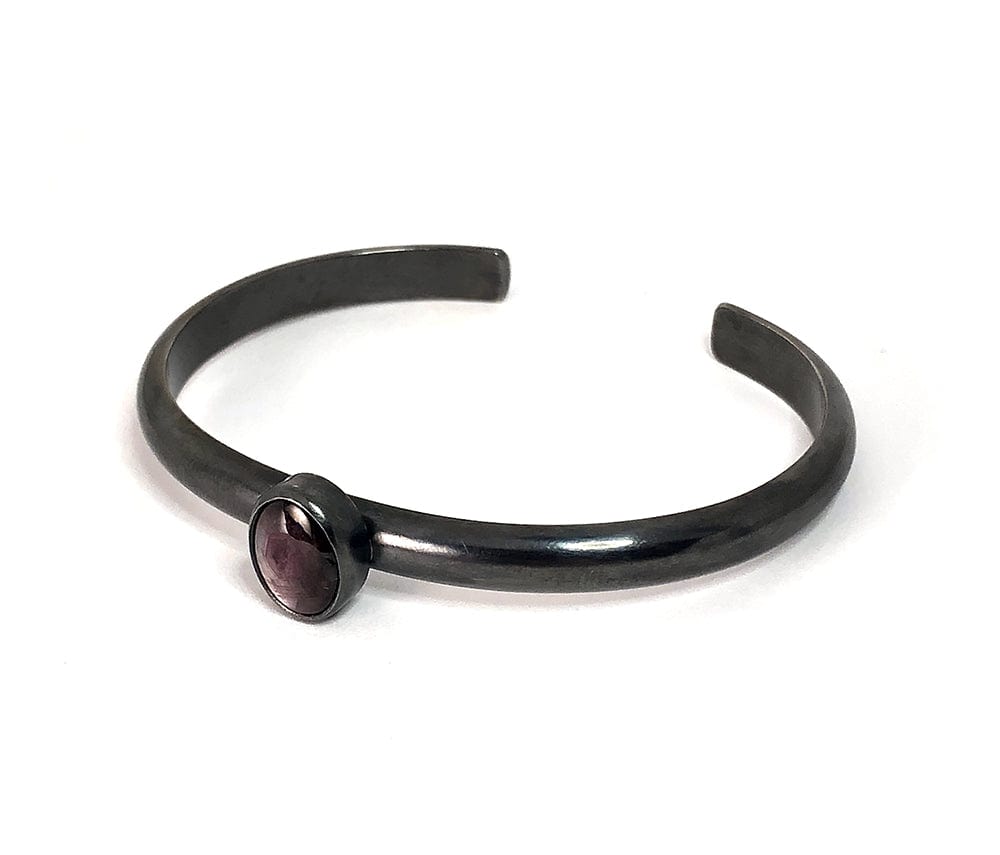 Star Ruby Bangle bracelet set in oxidized sterling silver.  Handmade by Alex Lozier Jewelry.  Season of the Witch collection.